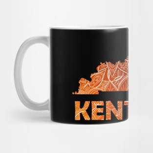 Colorful mandala art map of Kentucky with text in brown and orange Mug